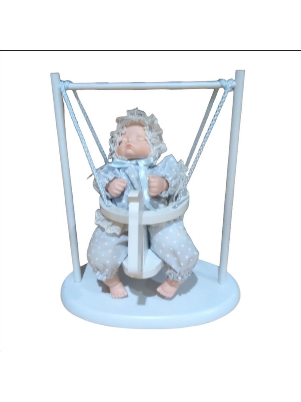 Musical "Brahm's Lullaby" 10" swinging Baby Porcelain Doll